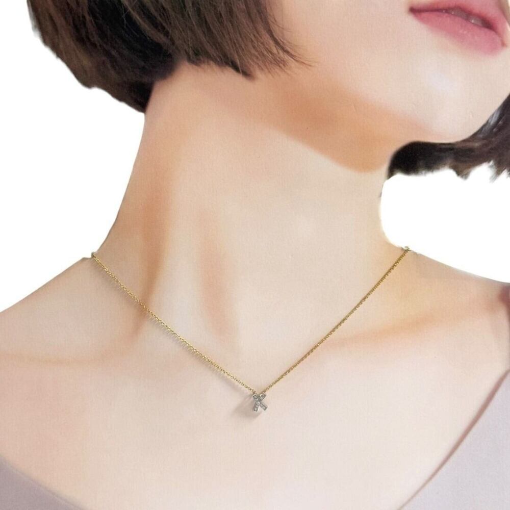 Tiffany & Co. Kiss pendant necklace, 18K gold, platinum, diamonds. - Picture 9 of 10
